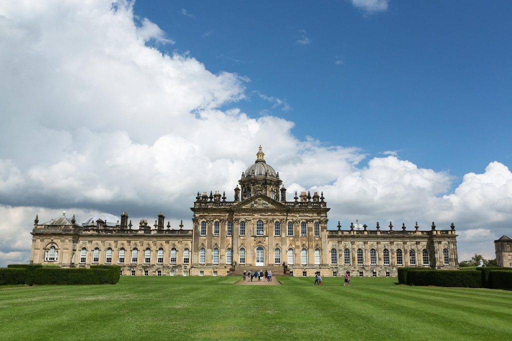 Castle Howard, a large country house with expansive lawn in front